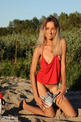 Attractive blonde on the sea   NakedTeen.photos