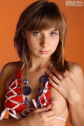 Blue eyes in orange colour   NakedTeen.photos