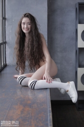 Curly brunette posing   NakedTeen.photos