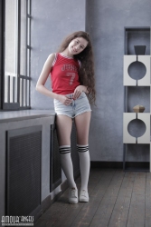 Curly brunette posing   NakedTeen.photos