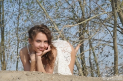 Nude model on sand dune   NakedTeen.photos