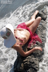 Woman getting nude in a summer season   NakedTeen.photos